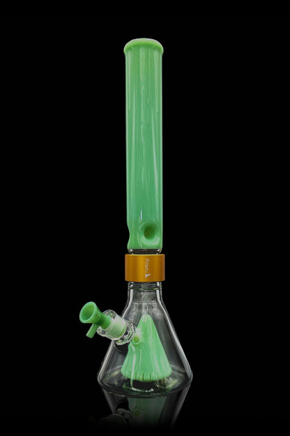 Green glass bong with water visible inside, studio shot on a black background.