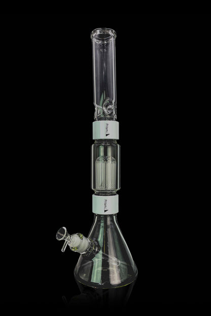 A glass bong with multiple filtration chambers, isolated on a black background.