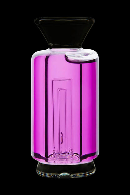 Glowing pink glass water pipe with intricate internal diffusion system.