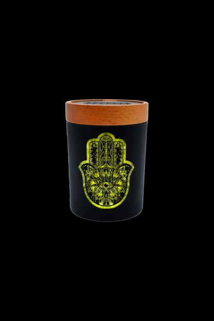 Black cannabis container with a gold Hamsa hand and floral design.