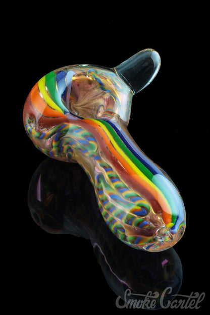 A side view of the Heavy Cane Worked Rainbow Spoon - Rainbow Mega Pipe, showcasing vibrant rainbow swirls within the thick-walled glass.
