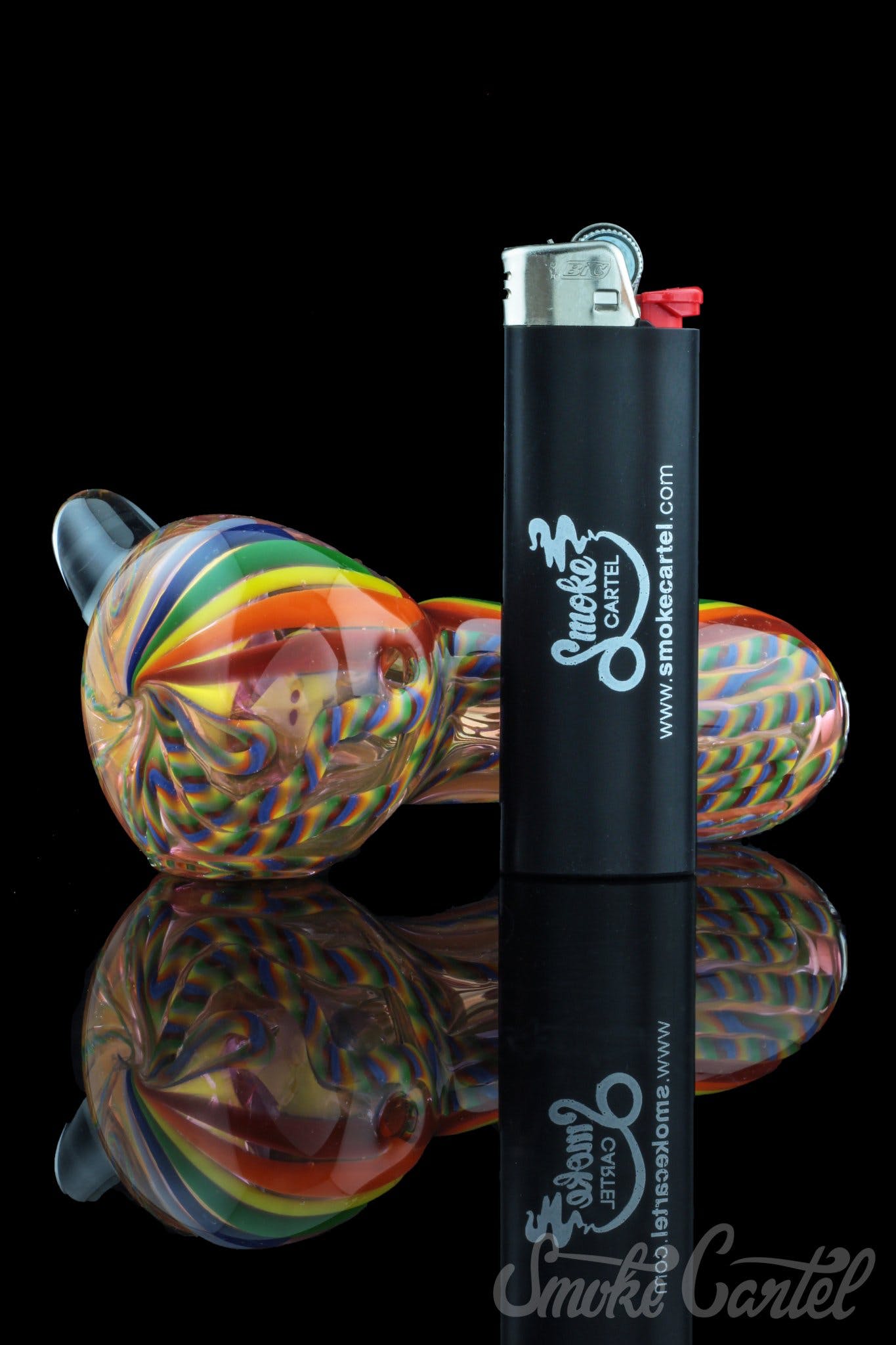 A vibrant close-up of the Heavy Cane Worked Rainbow Spoon - Rainbow Mega Pipe, displaying its colorful, swirling glasswork.
