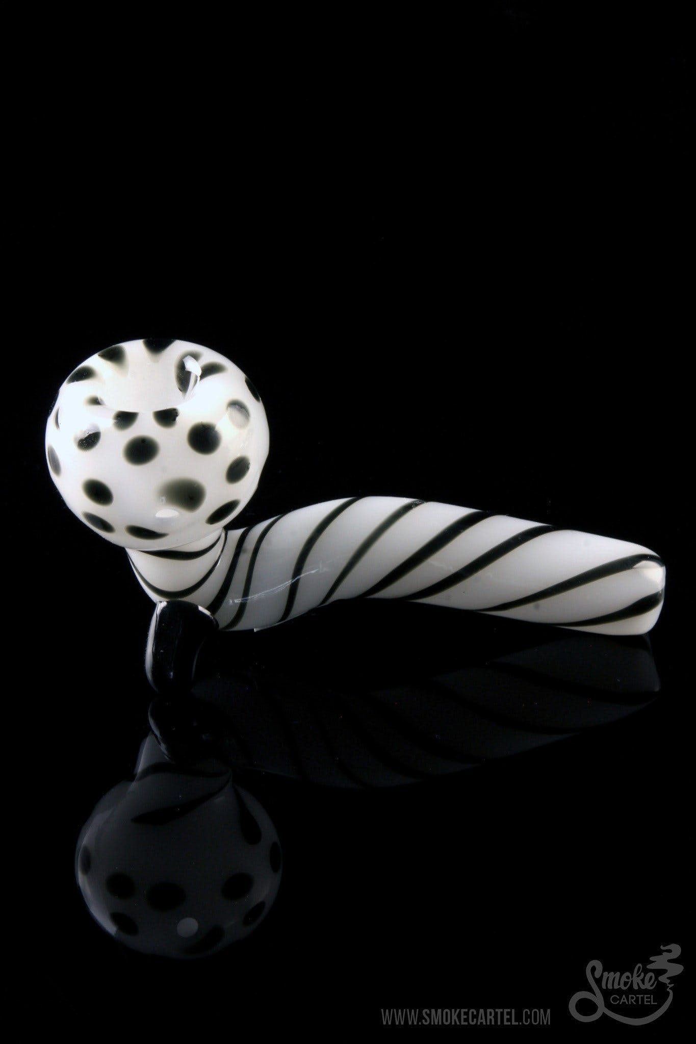 A detailed close-up of the Mr. Magnificent Sherlock pipe shows a swirling pattern on its smooth, clear glass body.