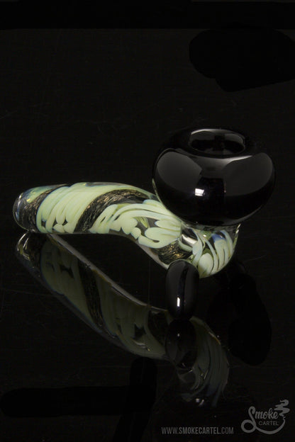 A studio shot of the LA Pipes Mini Sherlock with Slyme Cane and Dichro, displaying its curved bowl and colorful glasswork against a black backdrop.
