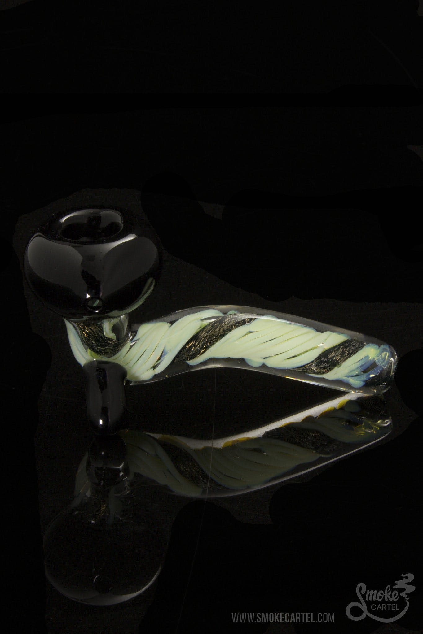 A close-up, angled view of the LA Pipes Mini Sherlock with Slyme Cane and Dichro, showcasing its colorful glasswork.