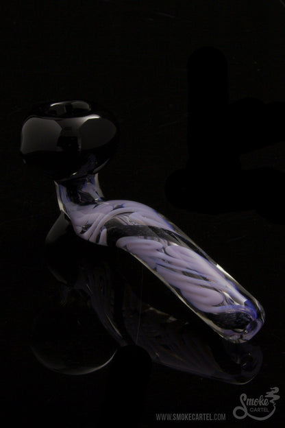 A side view of the LA Pipes Mini Sherlock with Slyme Cane and Dichro, showcasing its curved shape and colorful glasswork.