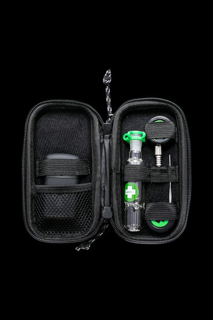 Open view of The Happy Dab Kit, displaying its contents within a black, zippered carrying case.