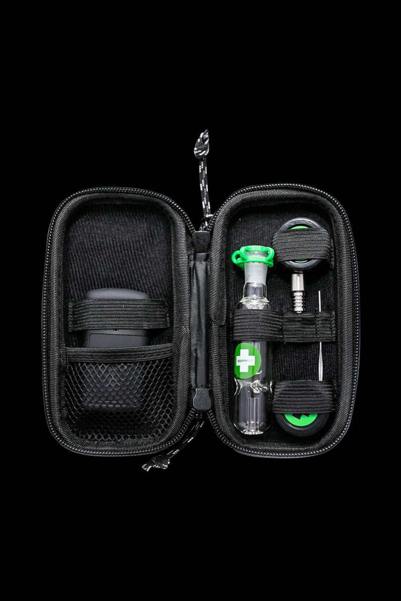 Open view of The Happy Dab Kit, displaying its contents within a black, zippered carrying case.