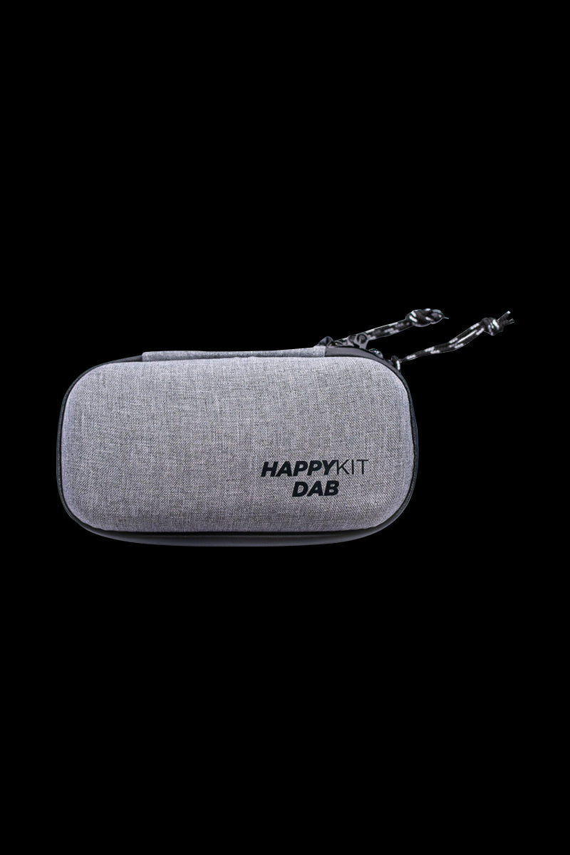 Front view of The Happy Dab Kit, a compact, textured case with a zipper closure and black pull tab.