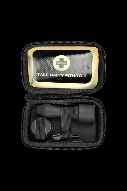 The Happy Dab Kit Mini is shown open, displaying its black, zippered case and internal contents in a top-down view.