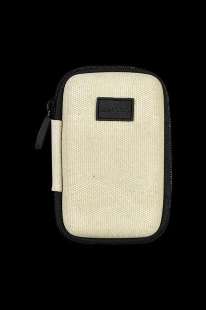 Front view of The Happy Dab Kit Mini, a compact, zippered pouch in a neutral tone with a dark accent pull.