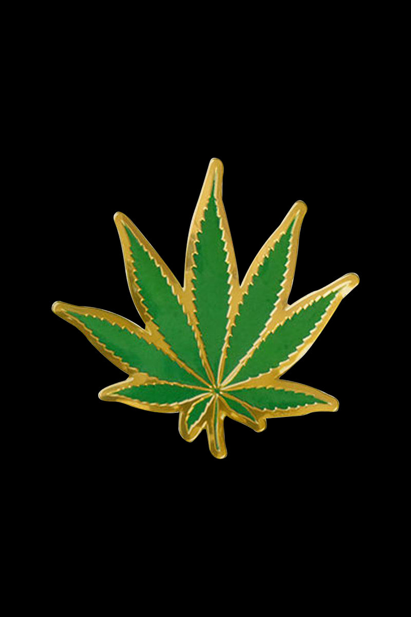 The Hemp Leaf Metal Sticker is shown as a detailed, metallic green leaf against a plain white background.