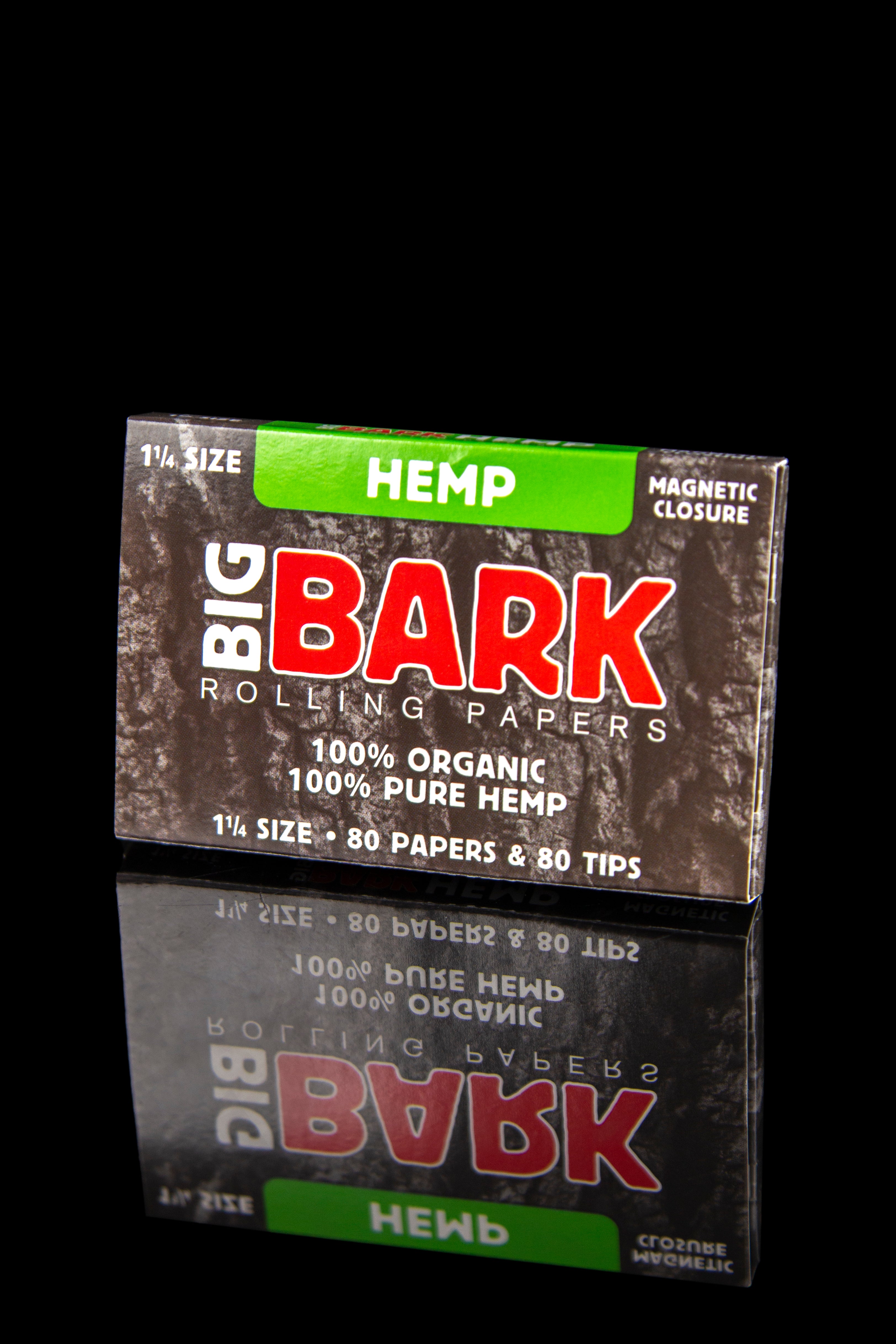 A box of “Big Bark” hemp rolling papers with a reflective surface, displaying “1 1/4 Size – 80 Papers & 80 Tips” and “100% Organic 100% Pure Hemp.” 