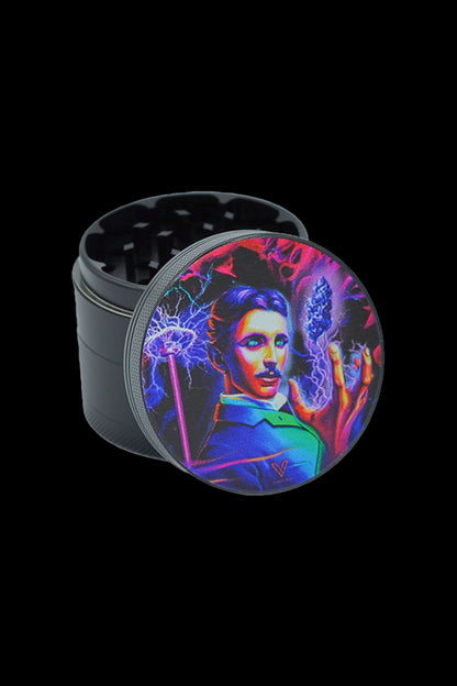 Metal cannabis grinder featuring a neon-lit portrait of Nikola Tesla surrounded by electrical imagery.