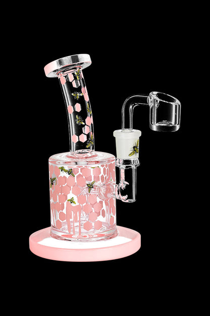 Front view of the Honeycomb Drip Dab Rig, a clear glass rig with a unique, dripping honeycomb pattern.