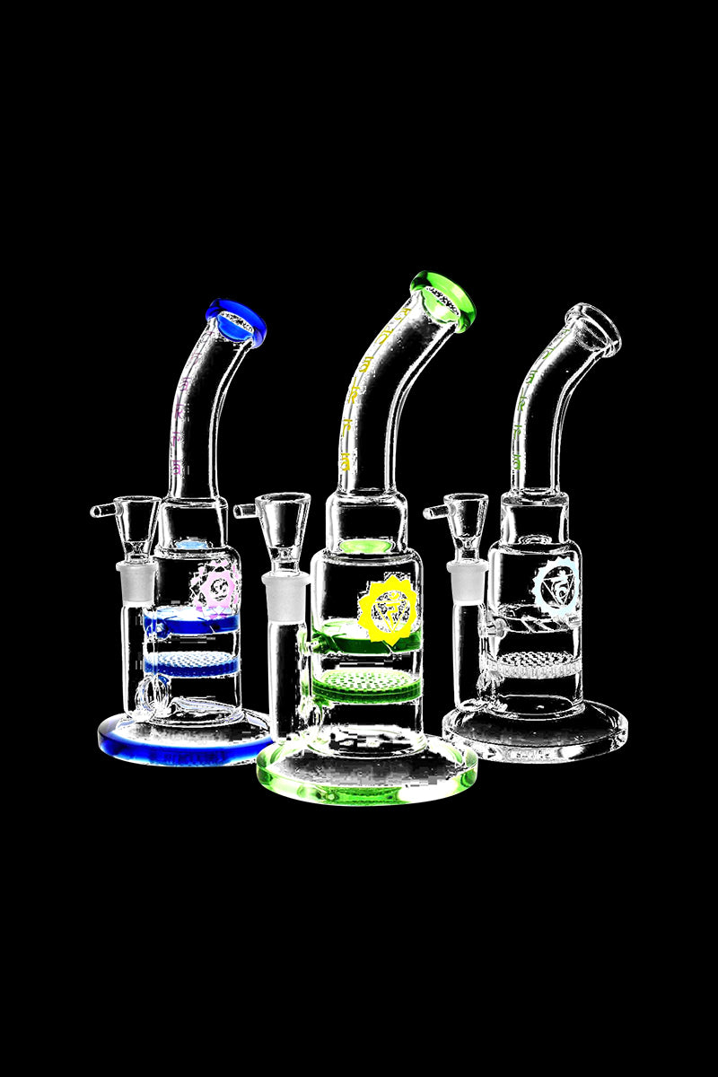 A front view of the Honeycomb & Vortex Perc Water Pipe, showcasing its clear glass construction and unique perc detailing.