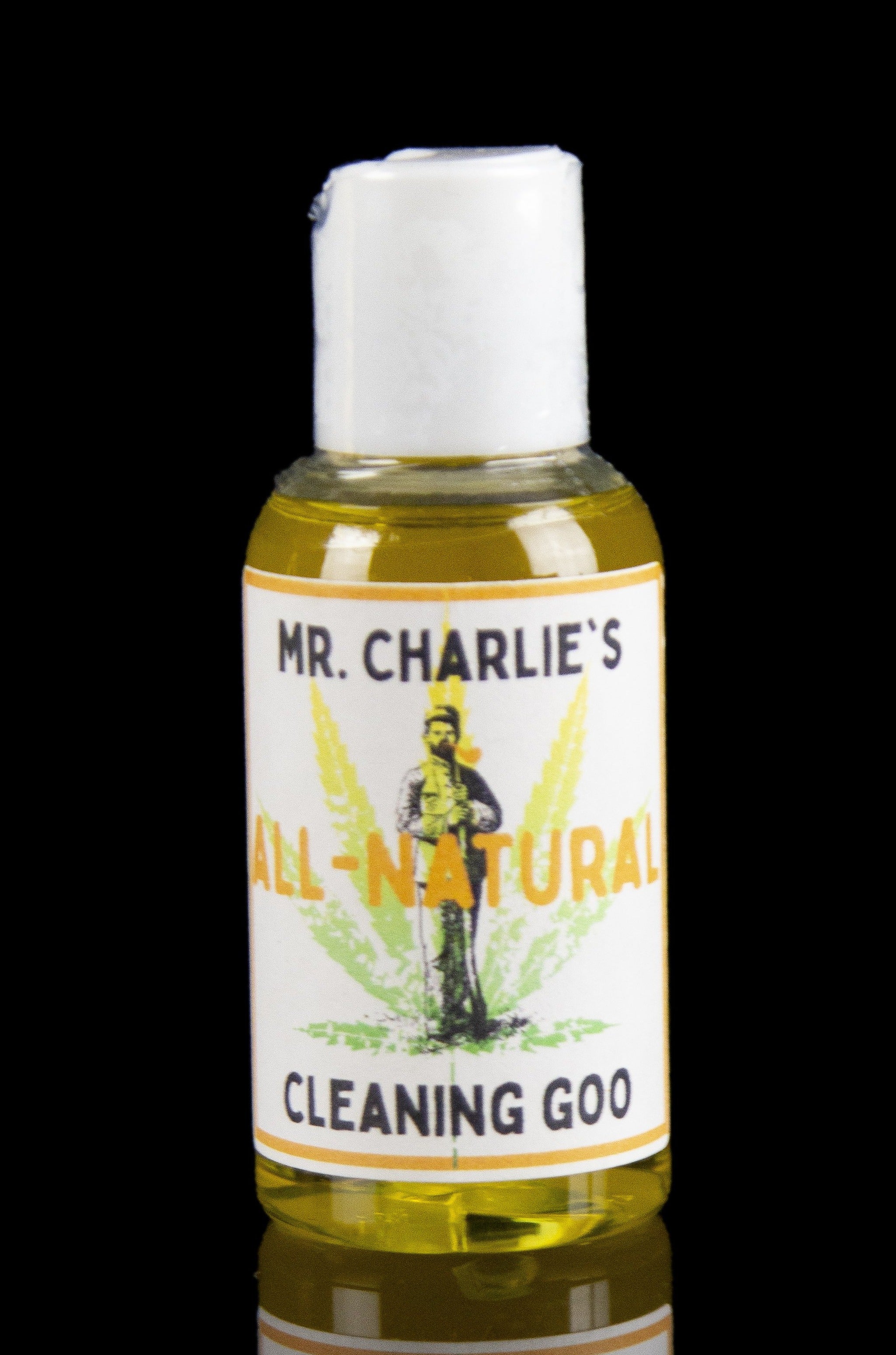A bottle of “Mr. Charlie’s All-Natural Cleaning Goo” with a vintage-style label featuring a cartoon character and cannabis leaves.