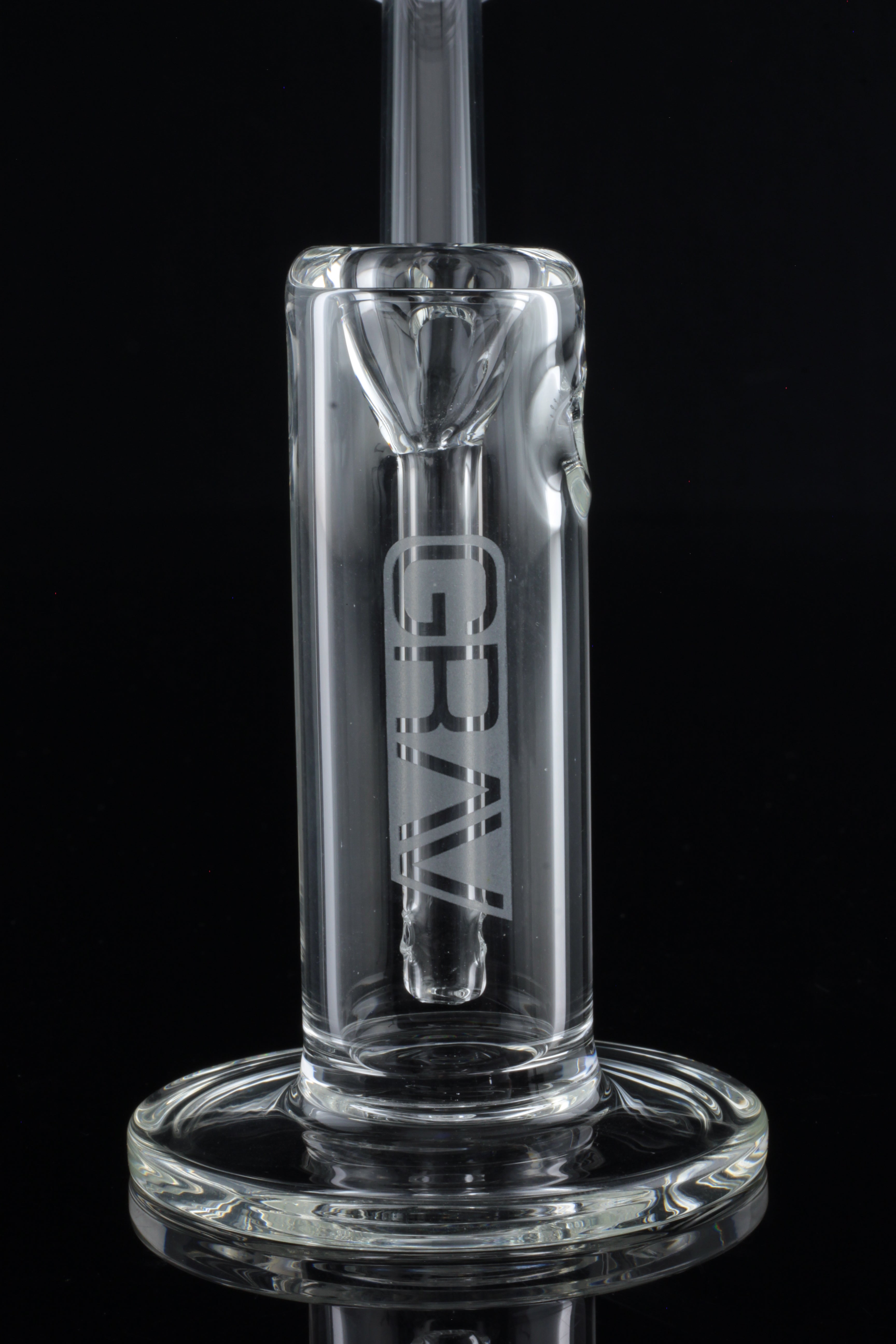 Clear glass dab rig with "GRAV" branding, isolated on a black background.
