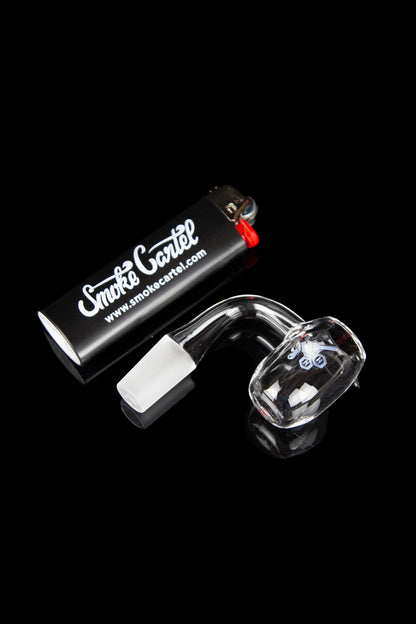 Quartz dab nail and carb cap with branded packaging.