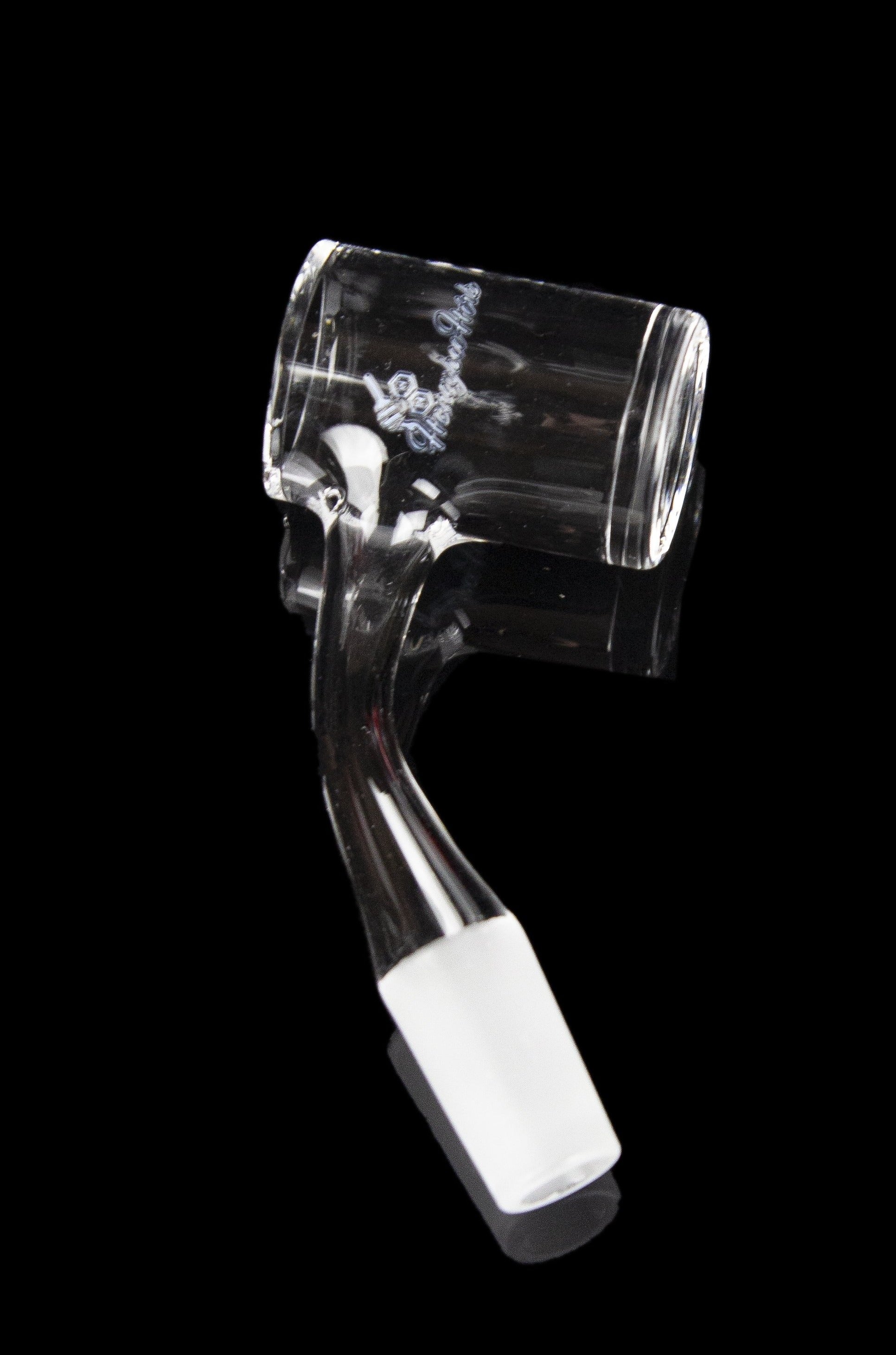 Clear glass cannabis dab rig with intricate design and angled mouthpiece.