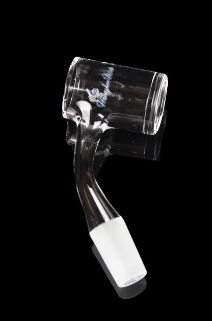 Clear glass cannabis dab rig with intricate design and angled mouthpiece.