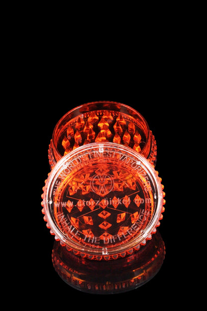 A close-up, angled view showcases the Storz & Bickel Plenty Vaporizer with a sleek, modern design against a dark background.