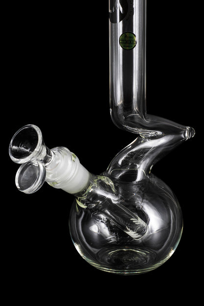 Clear glass bubbler water pipe for smoking cannabis, studio shot on black background.