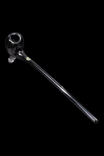 Black glass cannabis oil rig with a long, slender mouthpiece, isolated on a black background.