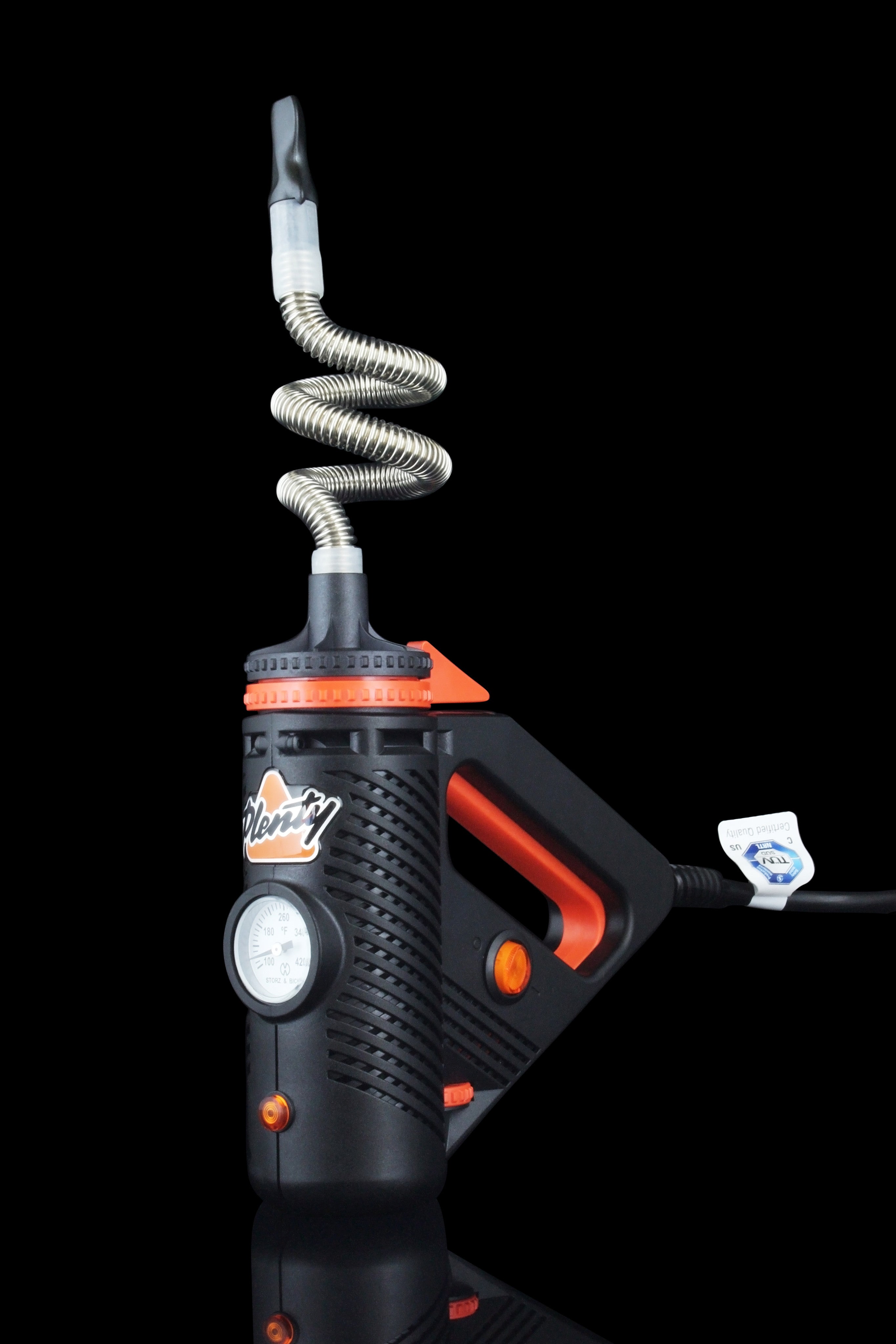 Front view of the Storz & Bickel Plenty Vaporizer, showcasing its coiled, black hose extending from the handheld device.