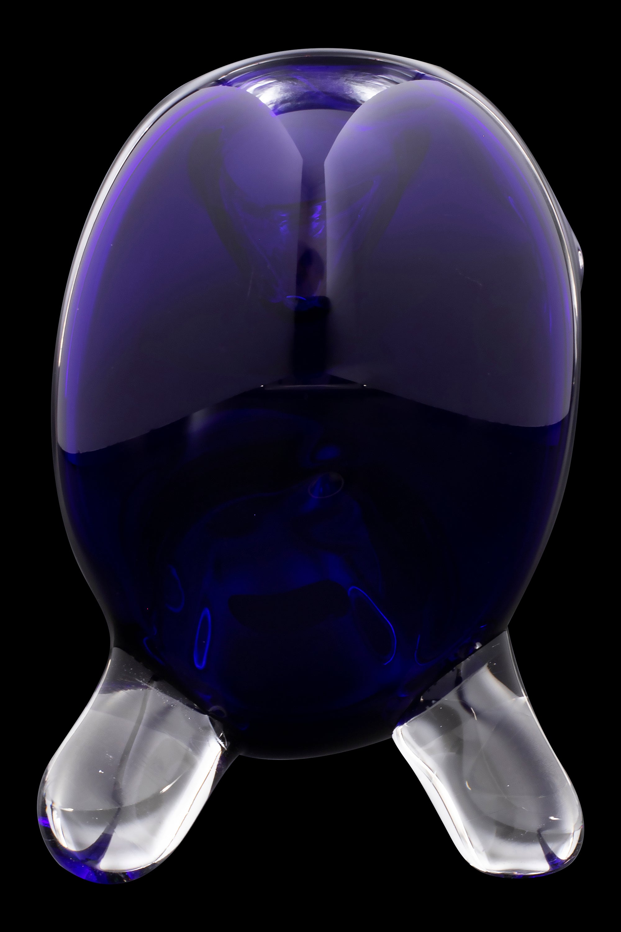 Purple glass water pipe with clear feet, isolated on black.