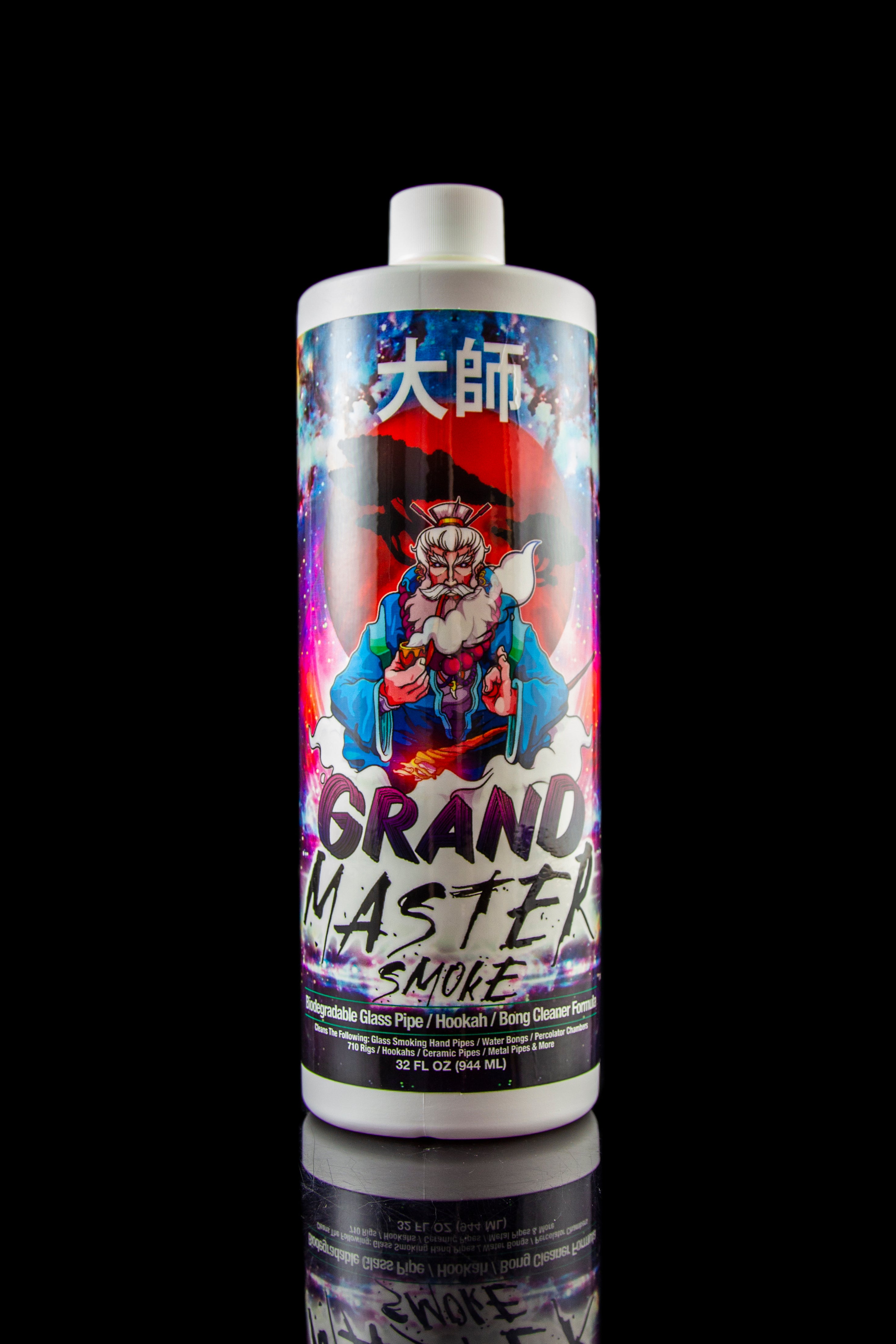 A purple plastic bottle of “Grand Master Smoke” cleaning solution with a vibrant anime-style illustration of a bearded man in red robes. The bottle is reflected on a glossy black surface.