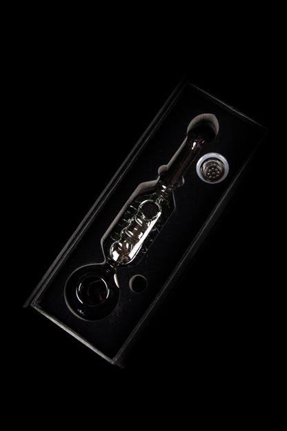 Glass oil rig with bubbler and dome, isolated on black.