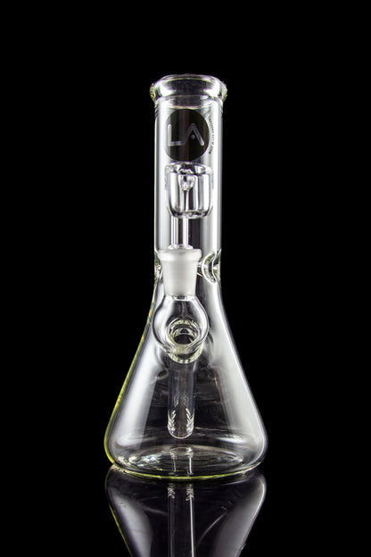 Clear glass water pipe (bong) with ice catch and brand logo, studio shot.