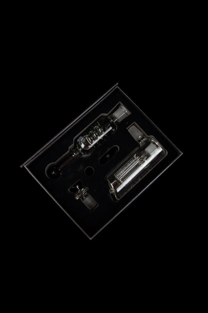 Clear glass dab rig components displayed in a plastic insert.