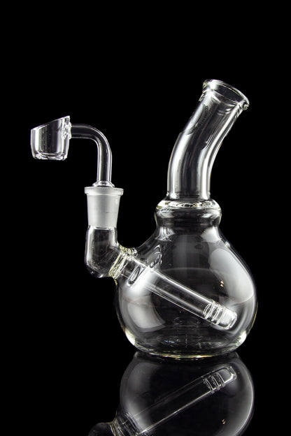 A front view of the LA Pipes Mini Bubble Base Concentrate Rig, showcasing its clear glass construction and rounded base.