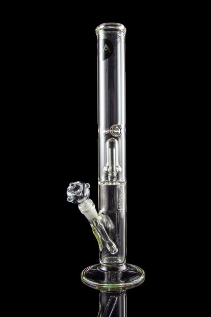 Clear glass bong with ice catch and intricate percolators, isolated on a black background.