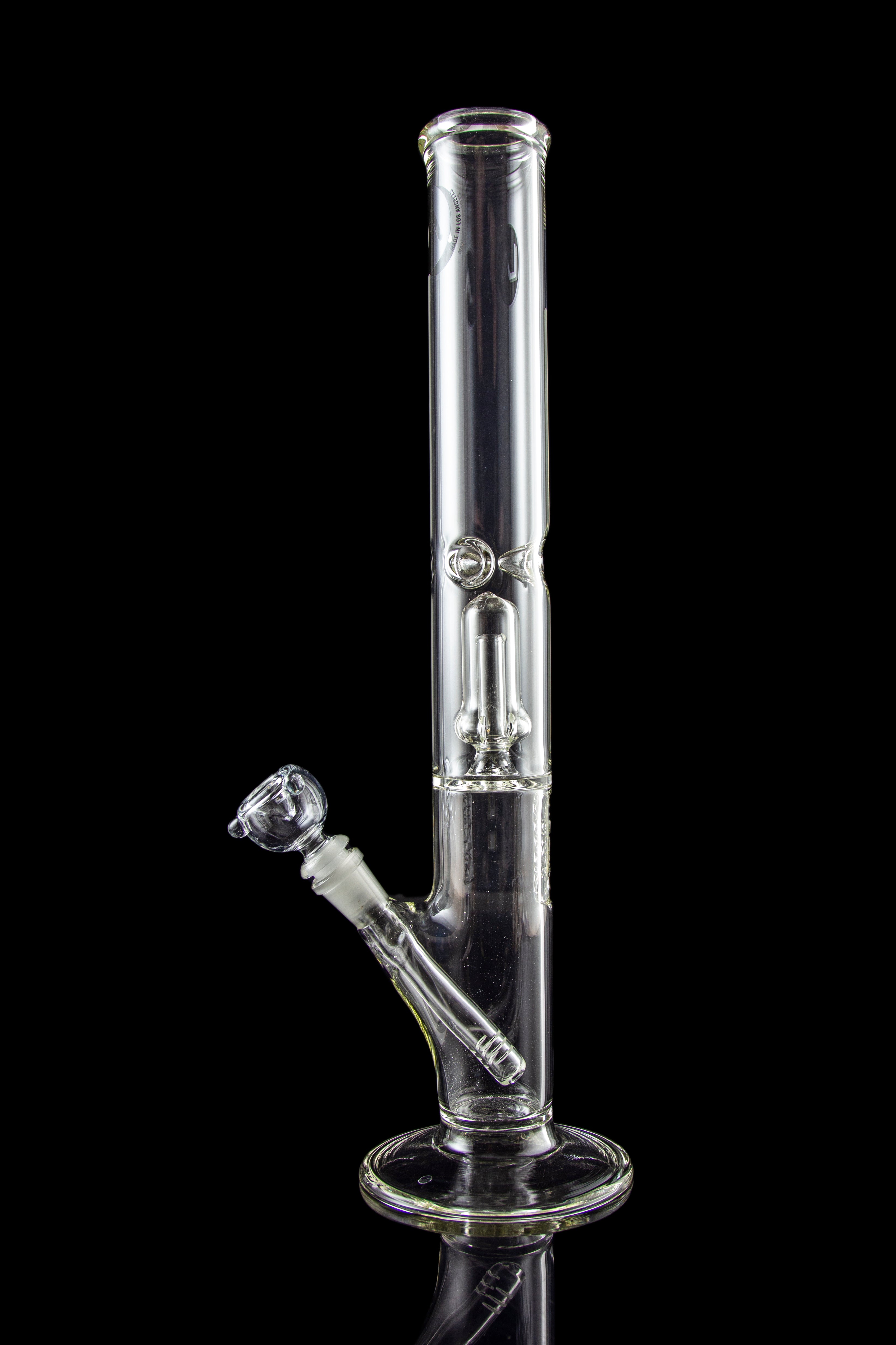 Clear glass bong with ice catcher and detachable downstem against a black background.