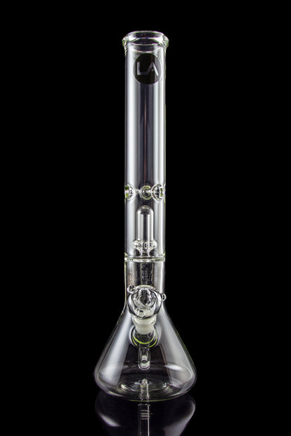 Clear glass bong with ice catcher and flared base, studio shot on a black reflective surface.