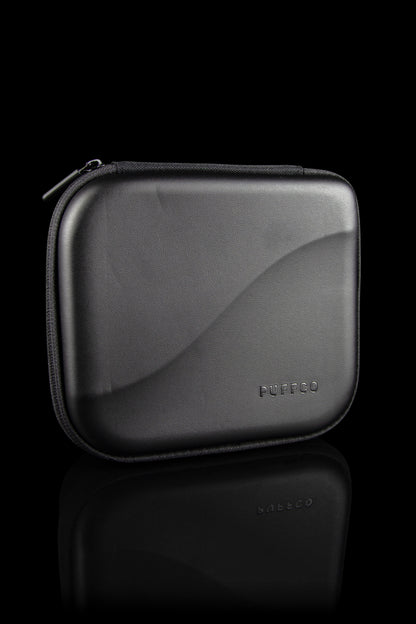 Black carrying case for a cannabis concentrate device, branded "PUFFCO".