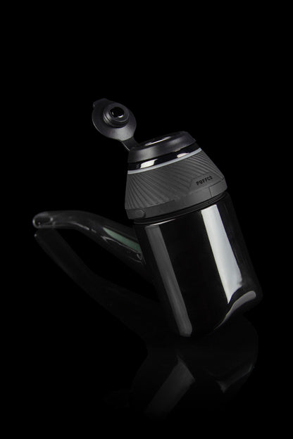 Black Puffco Peak Pro portable vaporizer with glass attachment.