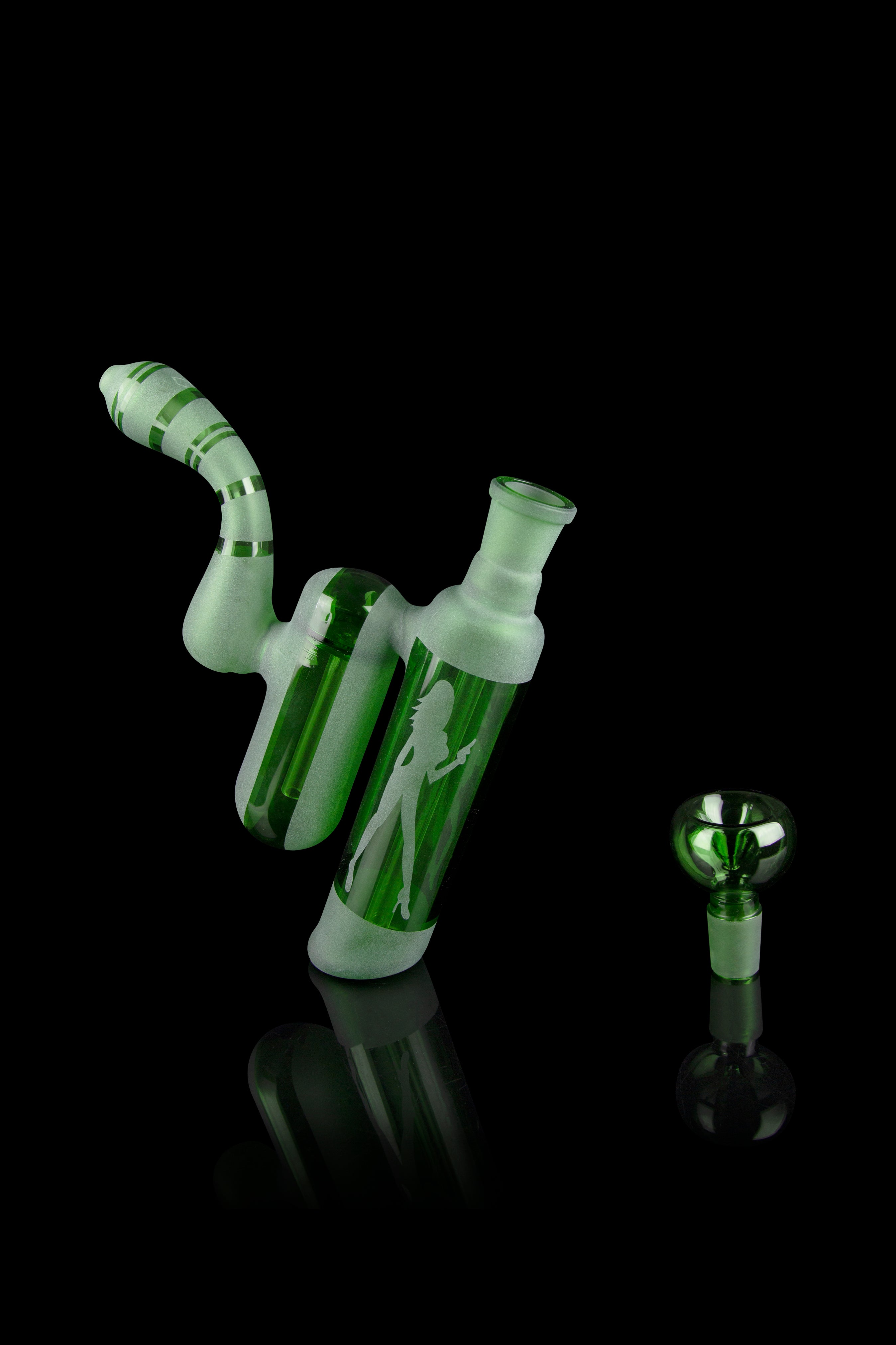 Green glass cannabis water pipes with detailed artwork, studio shot on black background.