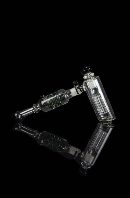 Clear glass rig with percolators against a black background.