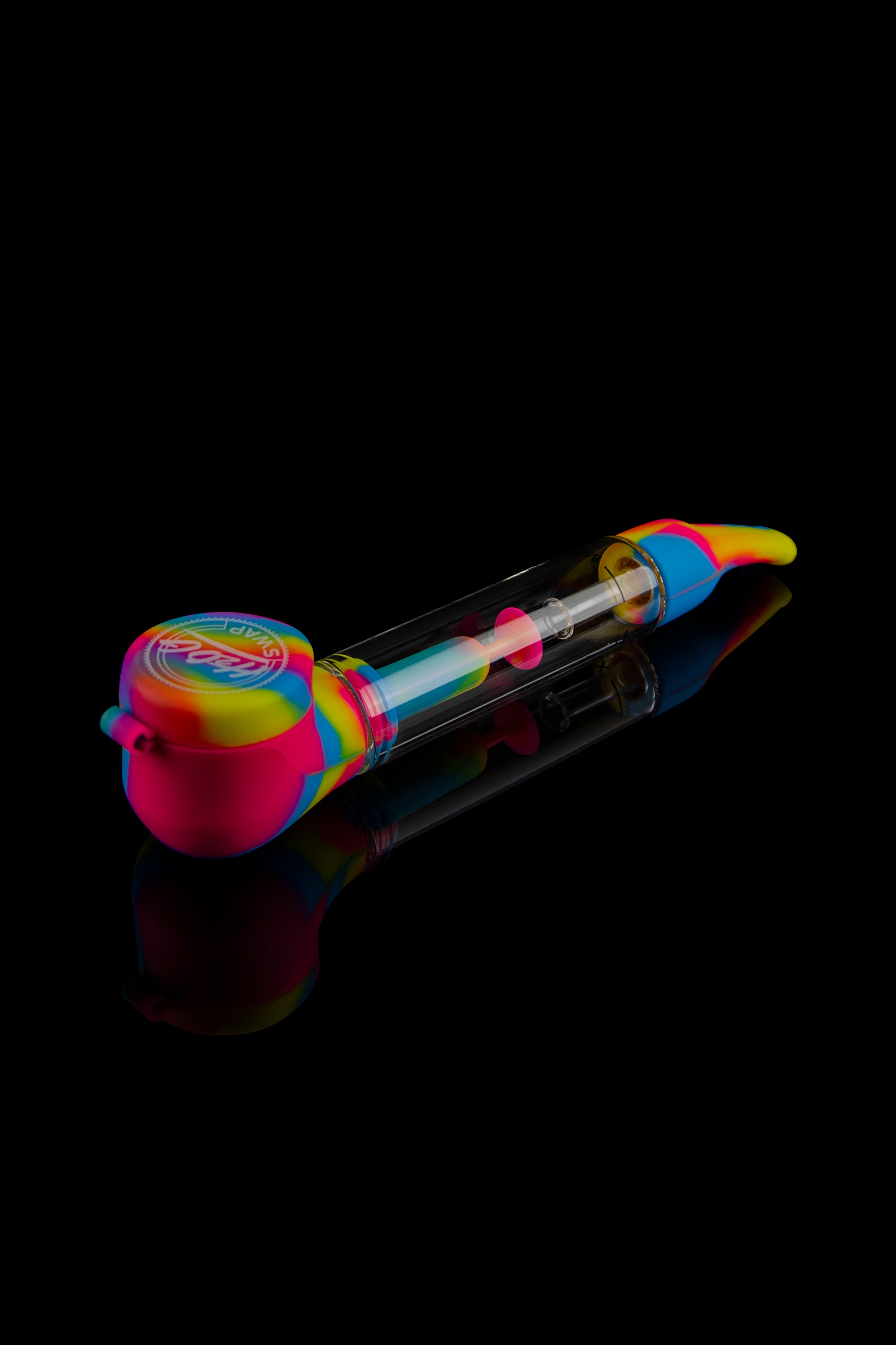 Iridescent silicone bubbler for cannabis use, studio shot on a reflective black surface.