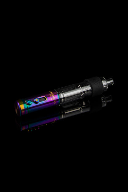 Vaporizer pen with a rainbow iridescent finish and glass cartridge against a black background.