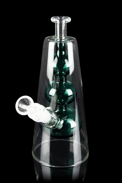 Green and clear glass water pipe (rig) with a bowl piece, isolated on a black background.