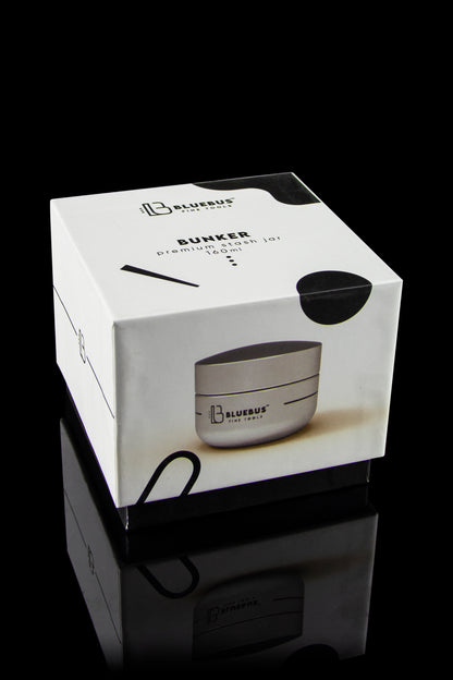 White Bluebus premium stash jar packaging with a reflective surface.