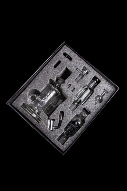 Cannabis dab rig set displayed in a foam-lined case.