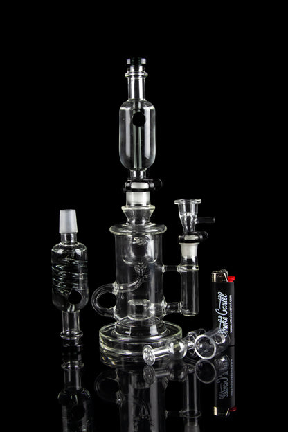 Clear glass water pipe (rig) with multiple chambers and percolators, studio shot.