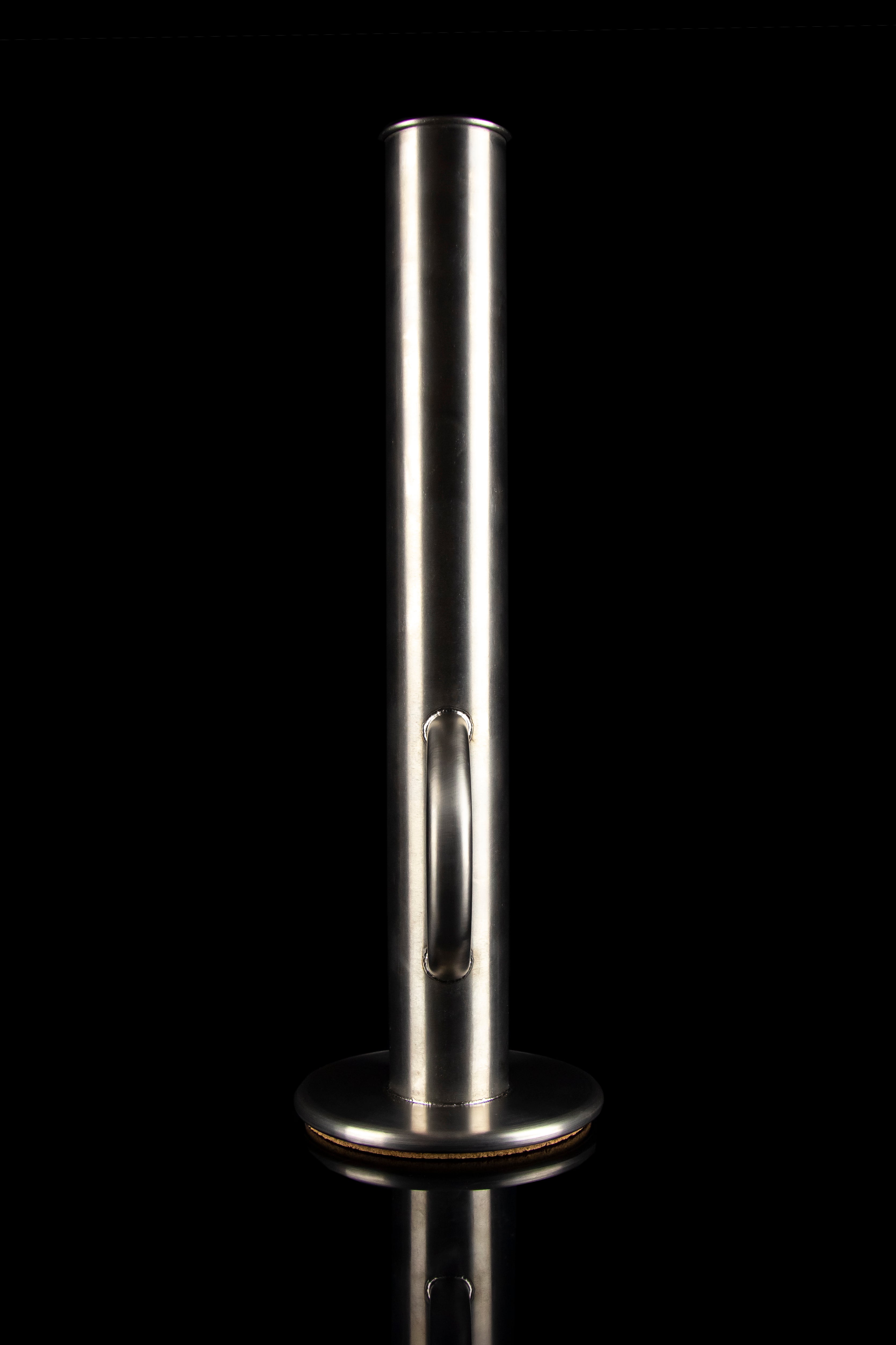 Sleek, metallic cannabis water pipe (bubbler) with a long, cylindrical body and a flared base, presented against a black background.