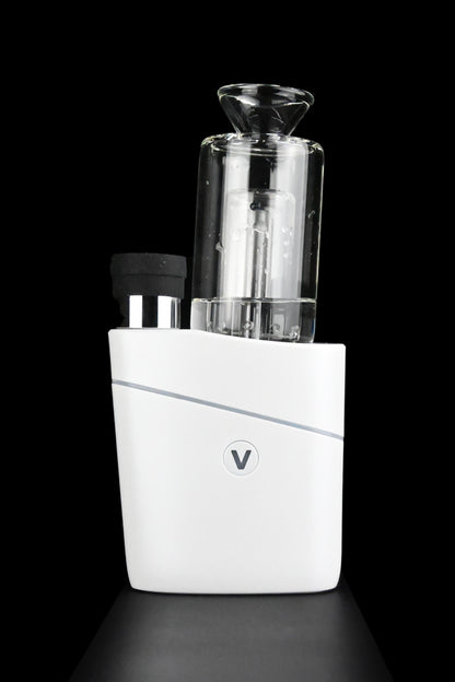 White cannabis e-rig with glass bubbler attachment, studio shot.